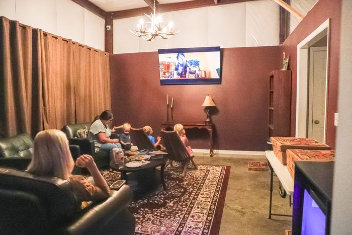 Guests relaxing on couches in the lounge